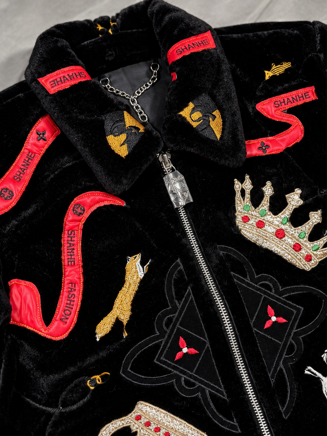 "Royal Crest" Black Velvet Bomber Jacket with Red Ribbon and Crown Embellishments