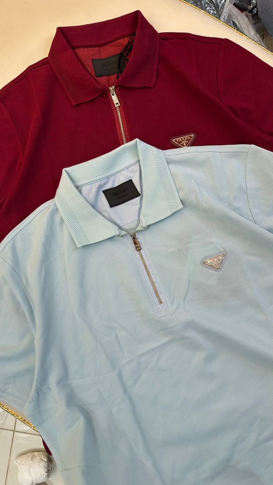 Imported T-Shirt with Front Zip and Metal Logo