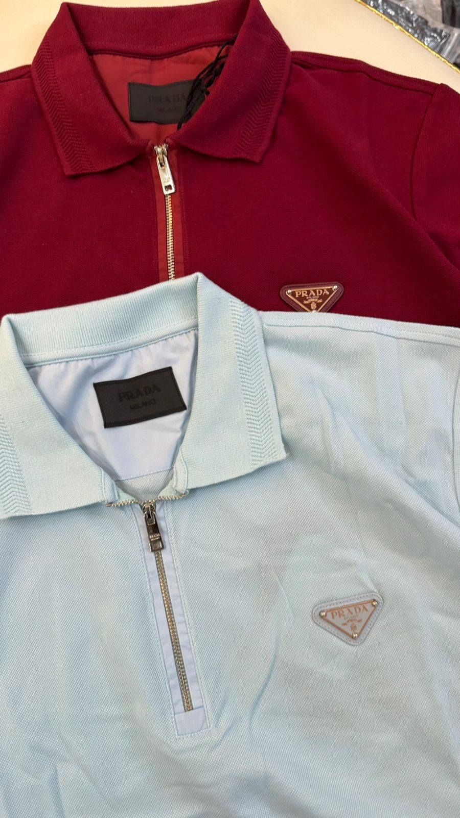 Imported T-Shirt with Front Zip and Metal Logo