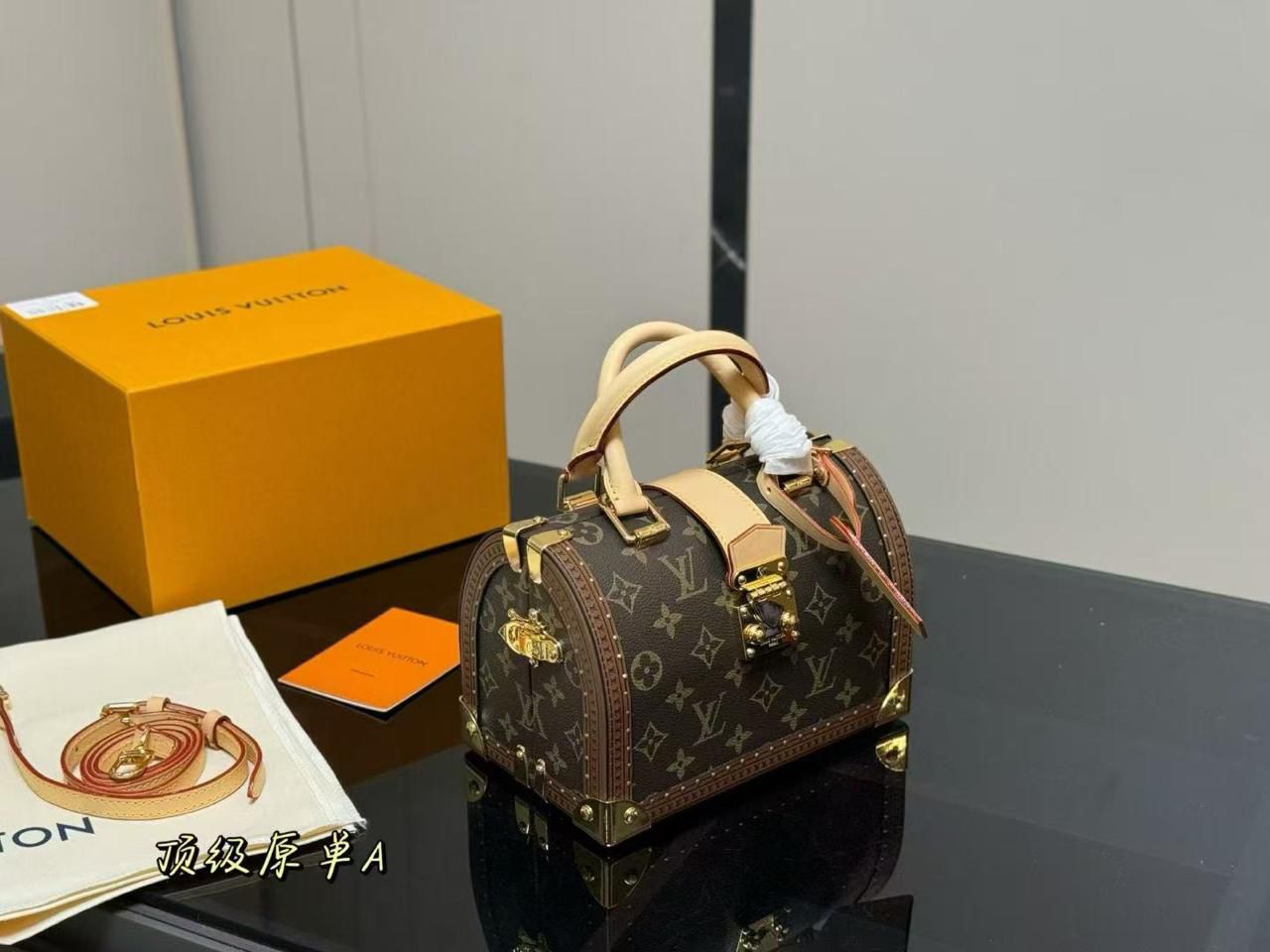 Luxury Petite Trunk Top Handle Bag – Heritage Monogram Edition